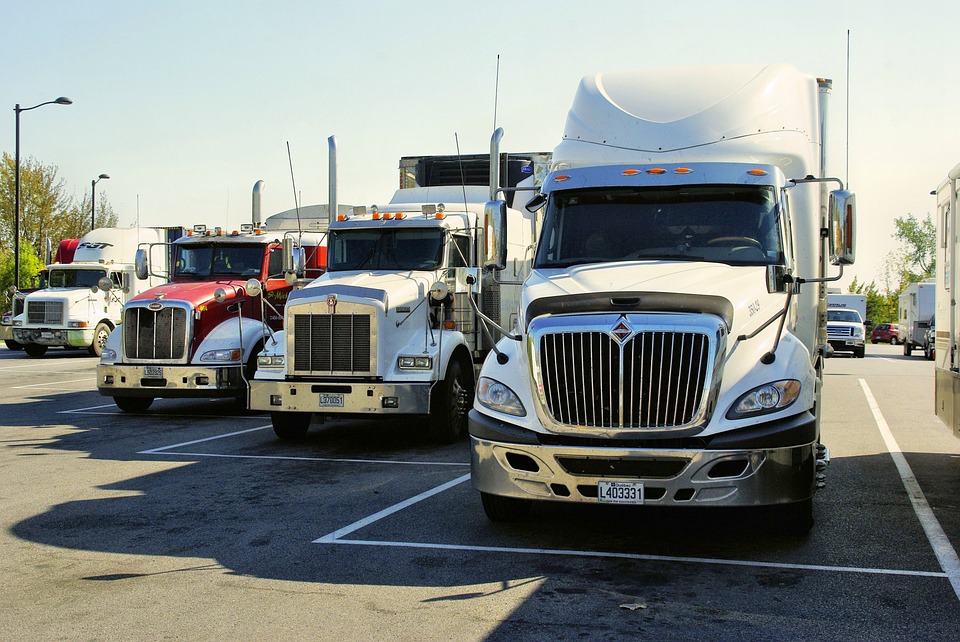 Long haul truck fleet in parking lot